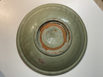 Two Chinese Longquan celadon dishes with underglaze design, Ming